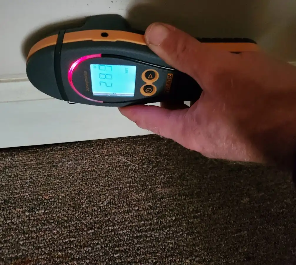 Moisture detection at baseboard during Storm Damage Restoration in Pahrump